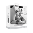 Attache en cuir agrafé avec menottes pour les mains et les chevilles